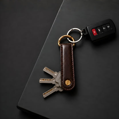 Dark brown leather key organizer holding car keys